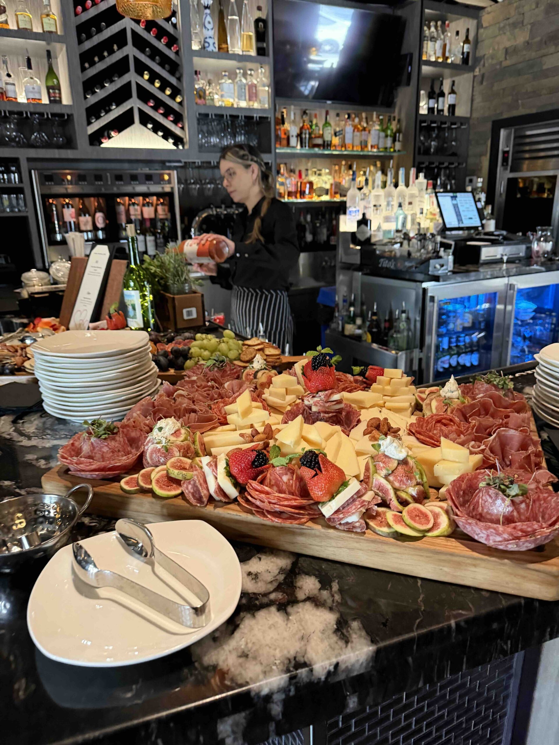 Tutti Mangia Bar Tender Making Drinks for Private Event